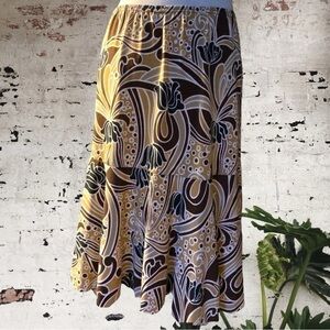 $5$ add on Carol Rose Nwot slinky floral design midi skirt. Size large